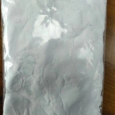 Βαμβακερή λευκή σκόνη, υφή λεπτής άμμου, χαμηλή πρόσθετη ποσότητα PTFE